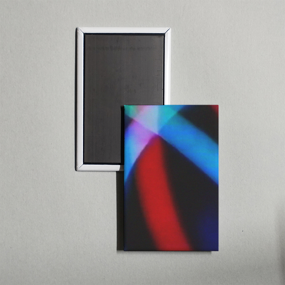 A Neon Crescent Mini Movie Fridge Magnet
